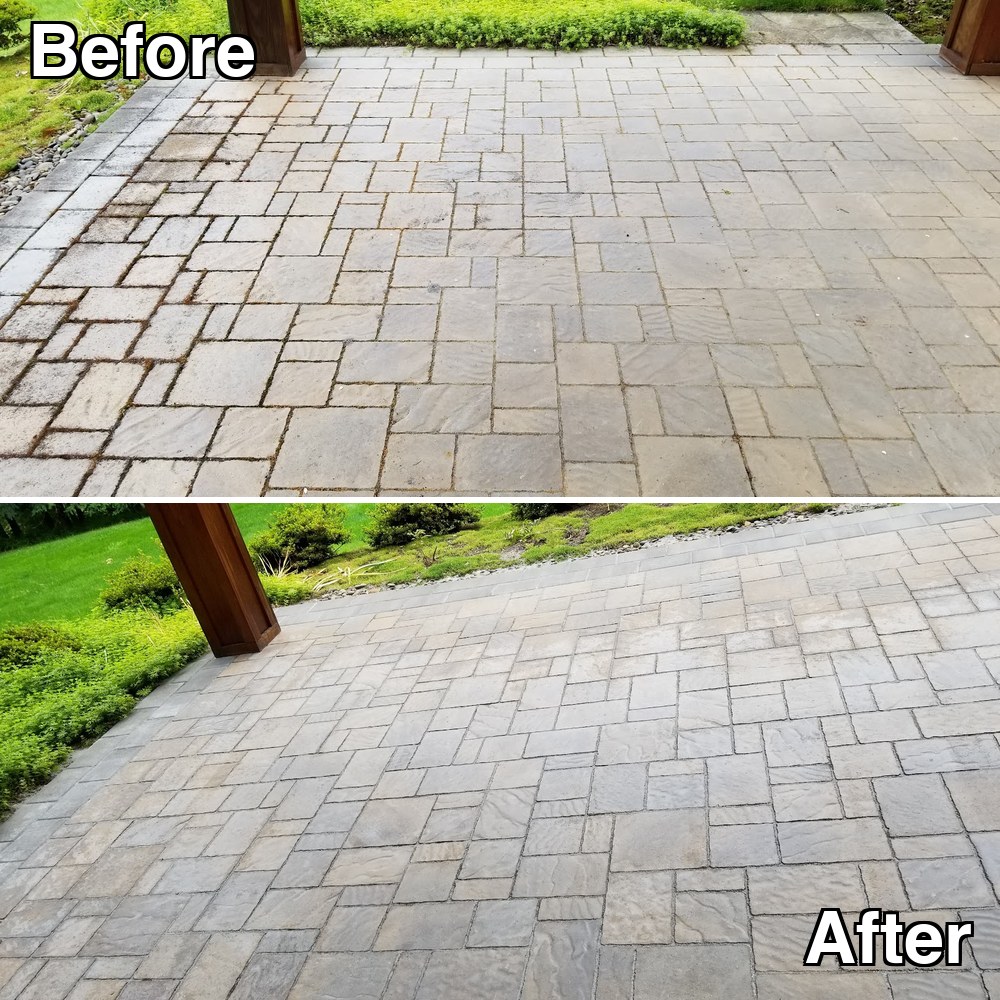 Before and after: a paver patio under a timber pergola, dulled by moss and weathering, cleaned to warm even stone