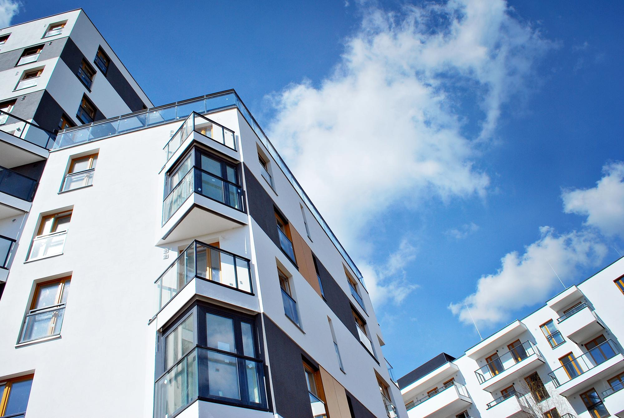 Modern multifamily apartment building — why multifamily investing makes sense