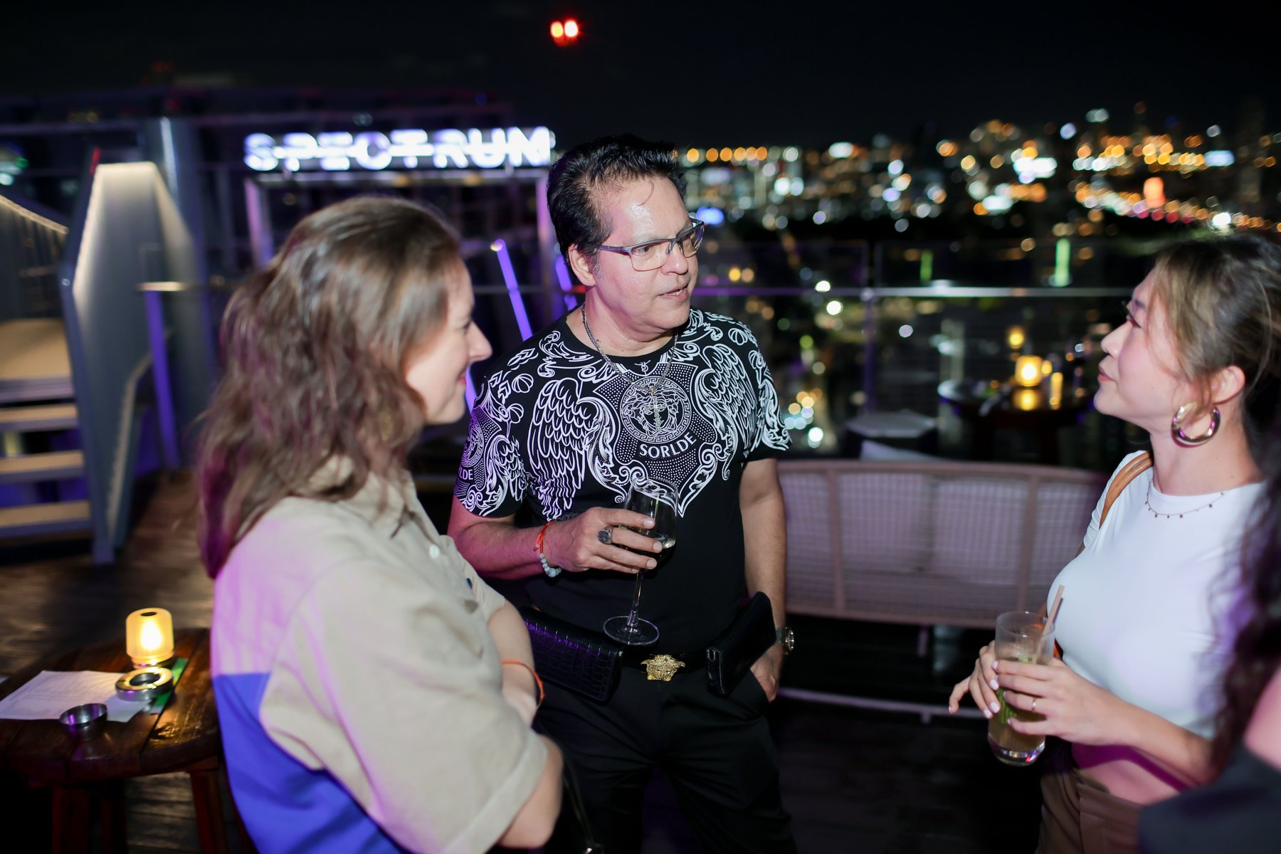 Conversation with a skyline view at a previous SPARK event in Bangkok