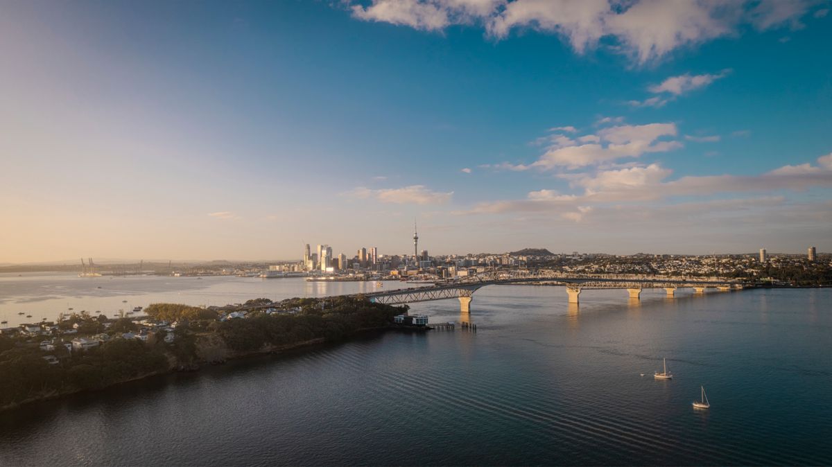 Auckland's skyline and Harbour Bridge at sunset