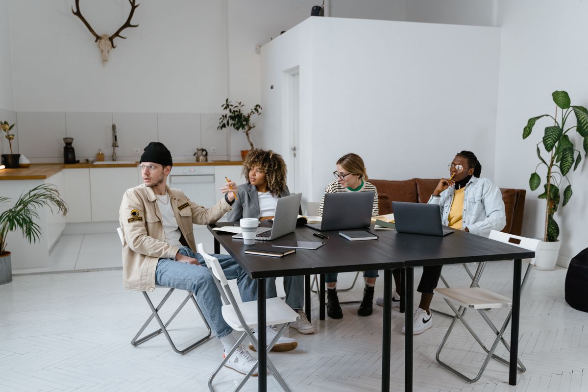Colleagues collaborating in a modern shared workspace
