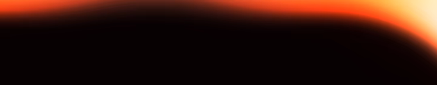 Close-up view of a solar eclipse with the sun's glowing orange-red corona visible around the darkened moon.