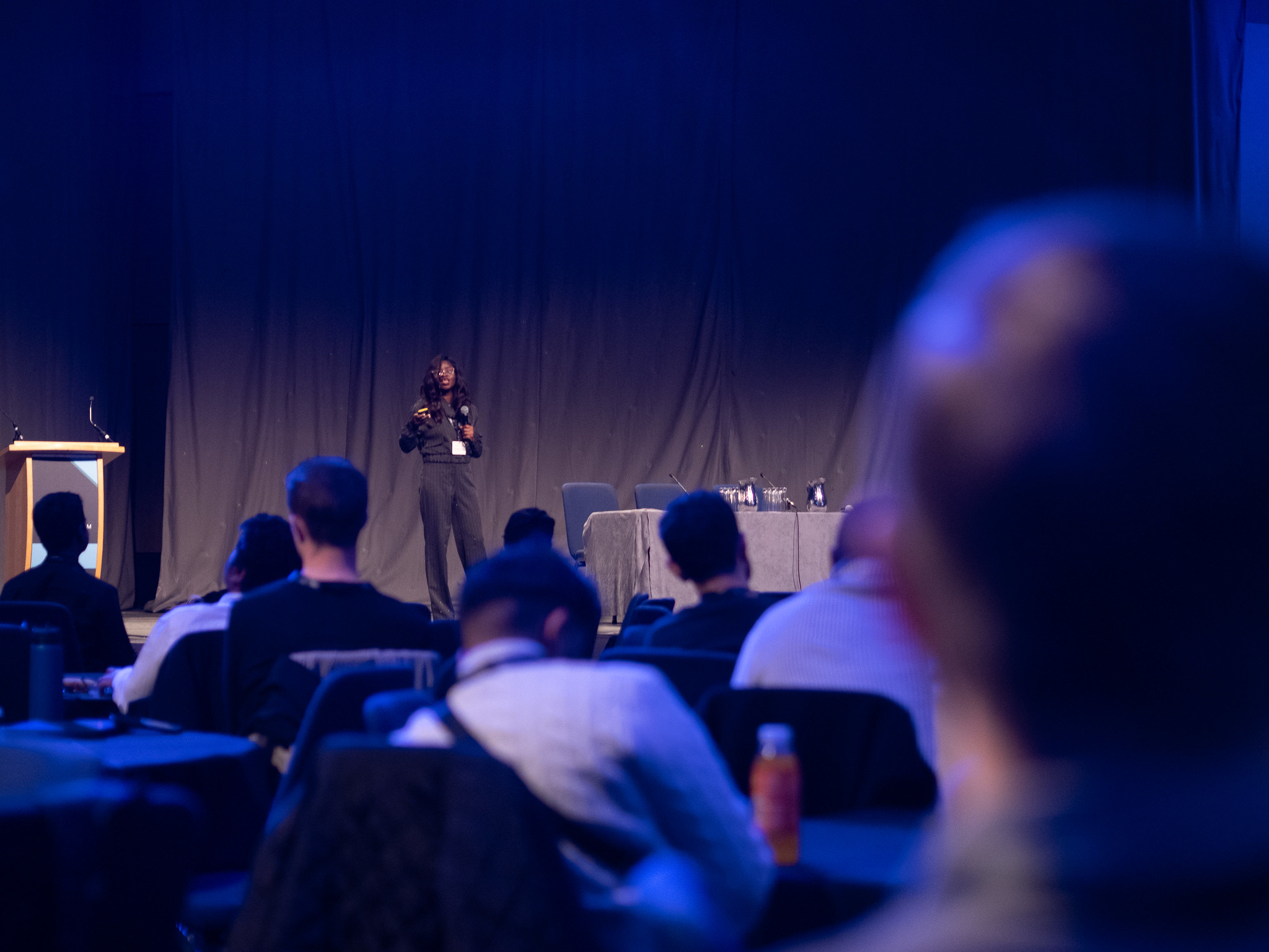 Cynthia Akiotu speaking at a conference