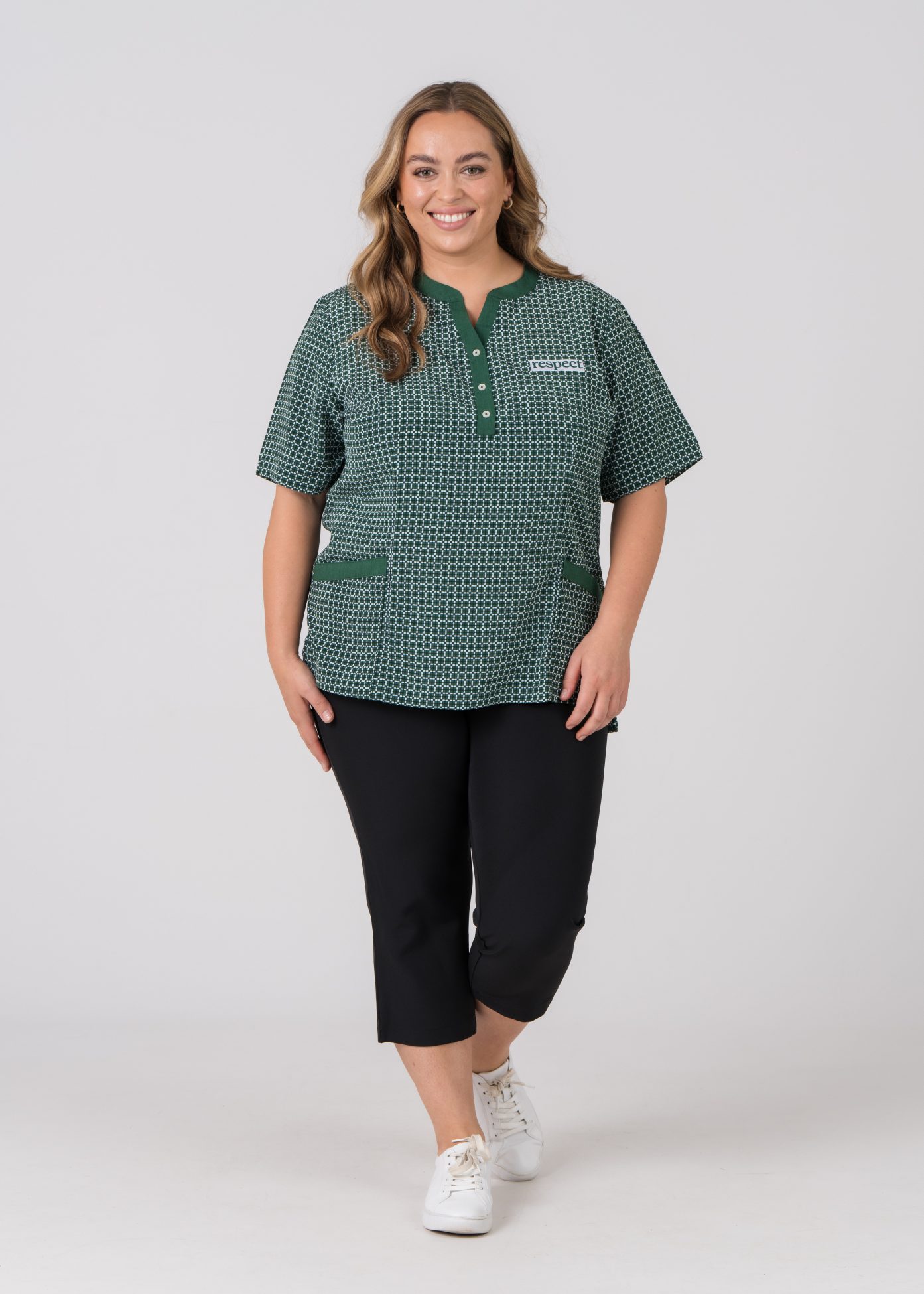 woman wearing respect checkered green tunic