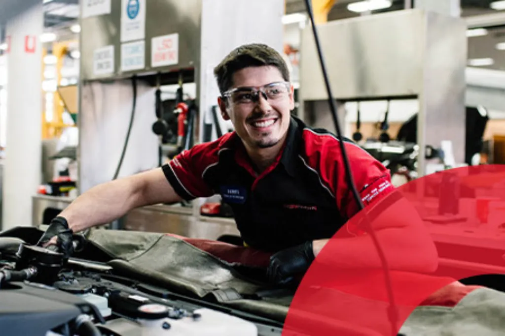 toyota technican wearing the nitro polo