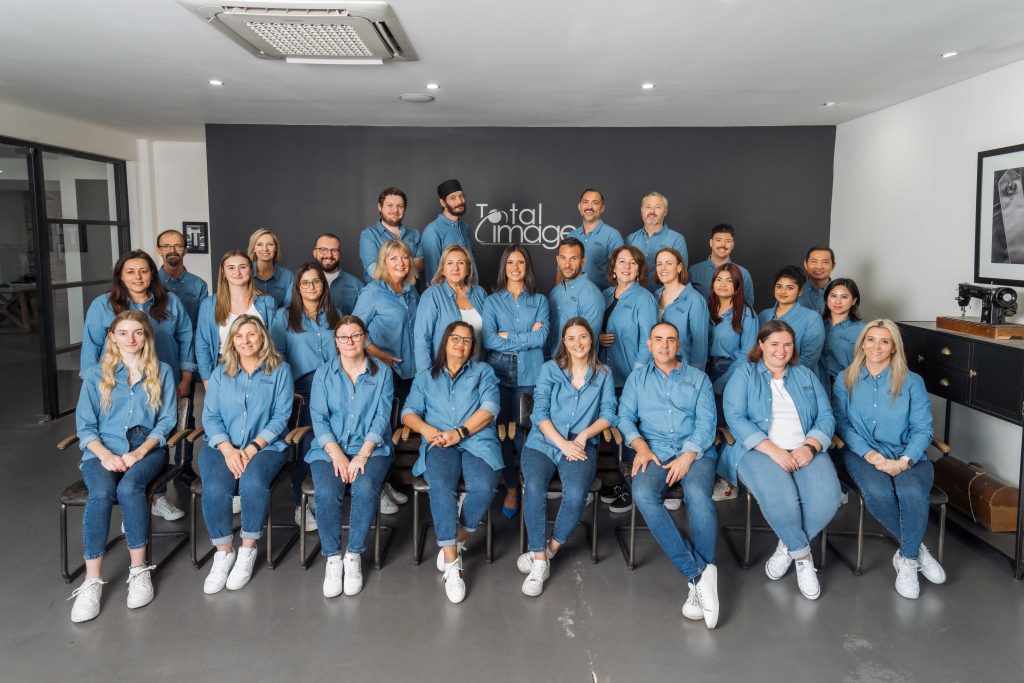 Total Image Full Team in denim uniforms