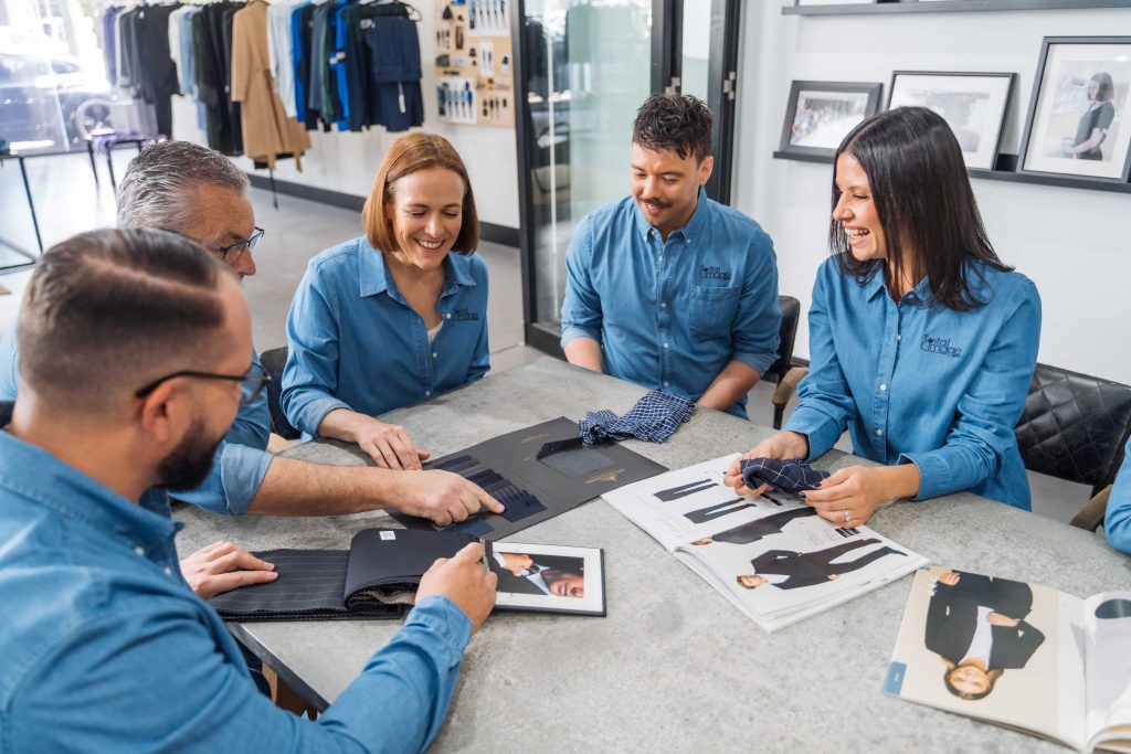 Total Image Sales team in denim uniform