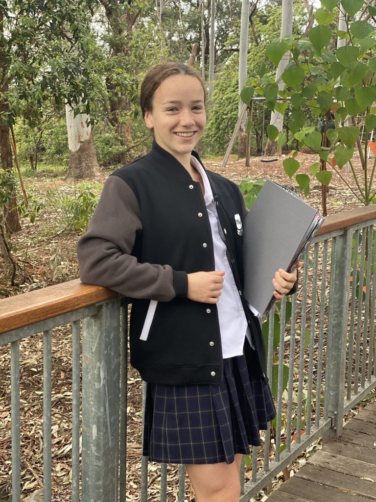 teenager in varsity jacket