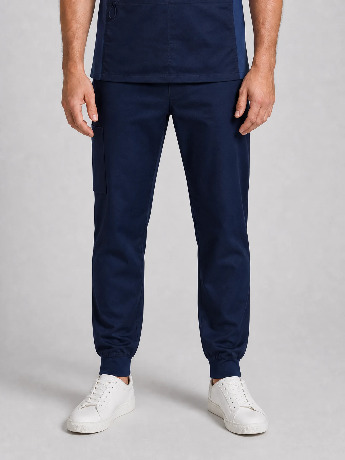 Men's Riley Slim Leg Jogger Scrub Pant in Midnight Navy – close-up detail