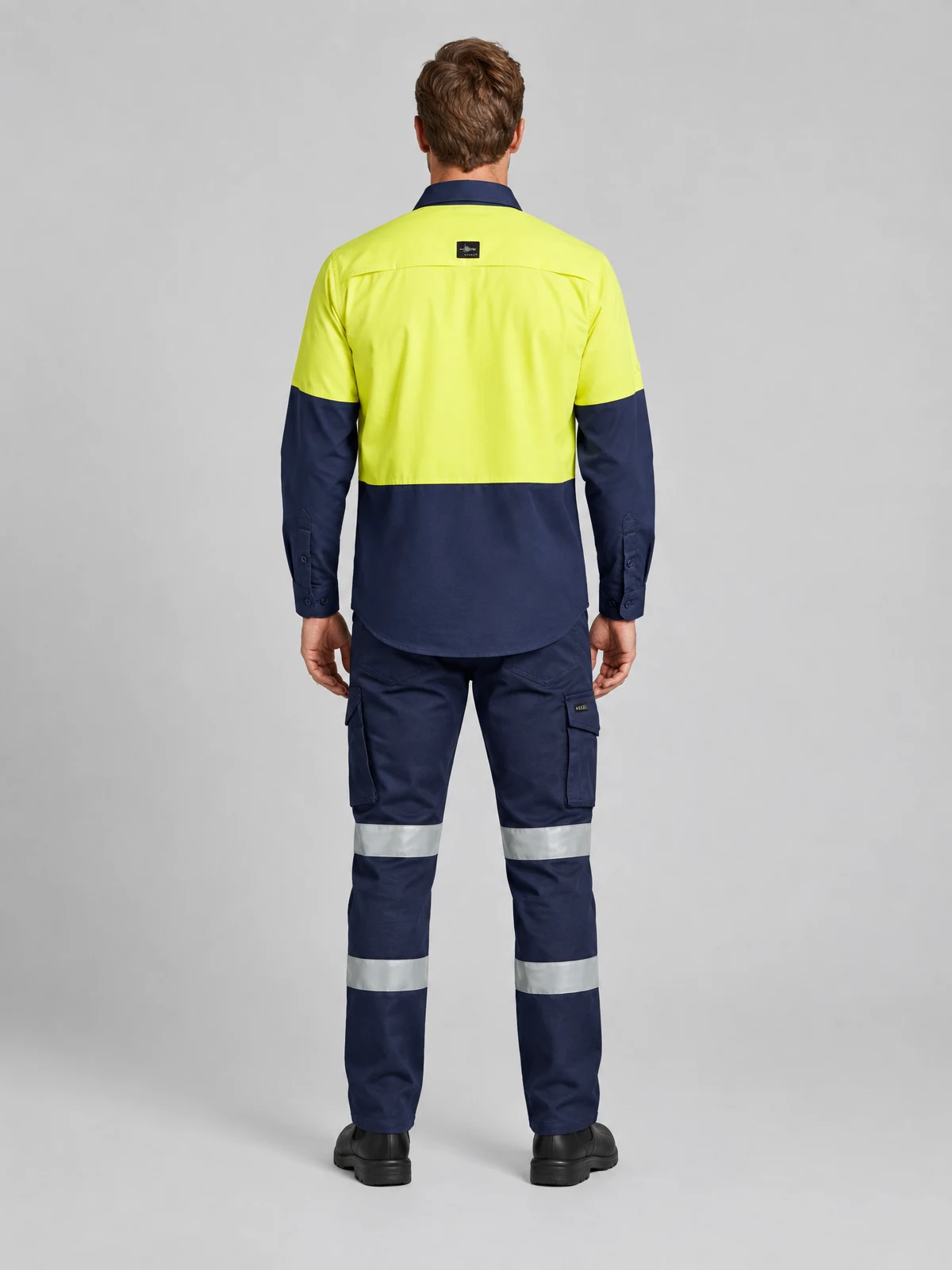 Men's Essential Stretch Taped Cargo Pant in Navy – back view