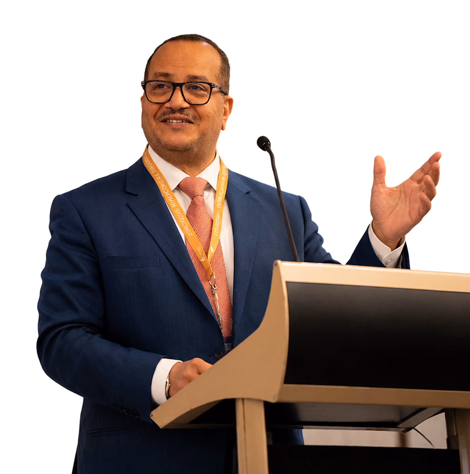 Dr Emad Hussein, international arbitrator and mediator, smiling during a conference session