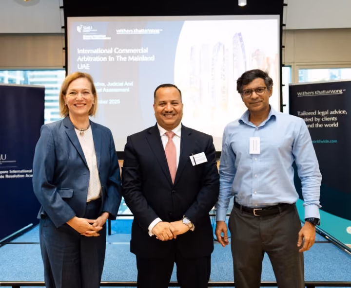Dr. Emad Hussein with fellow speakers at a seminar on international commercial arbitration in the UAE.