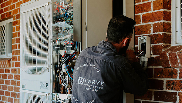 Maintenance on air-conditioner unit in a residential home