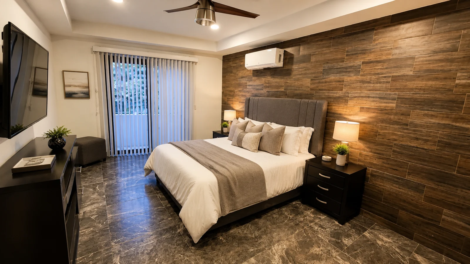 Sample Quince Sur bedroom with balcony door and wood-look feature wall