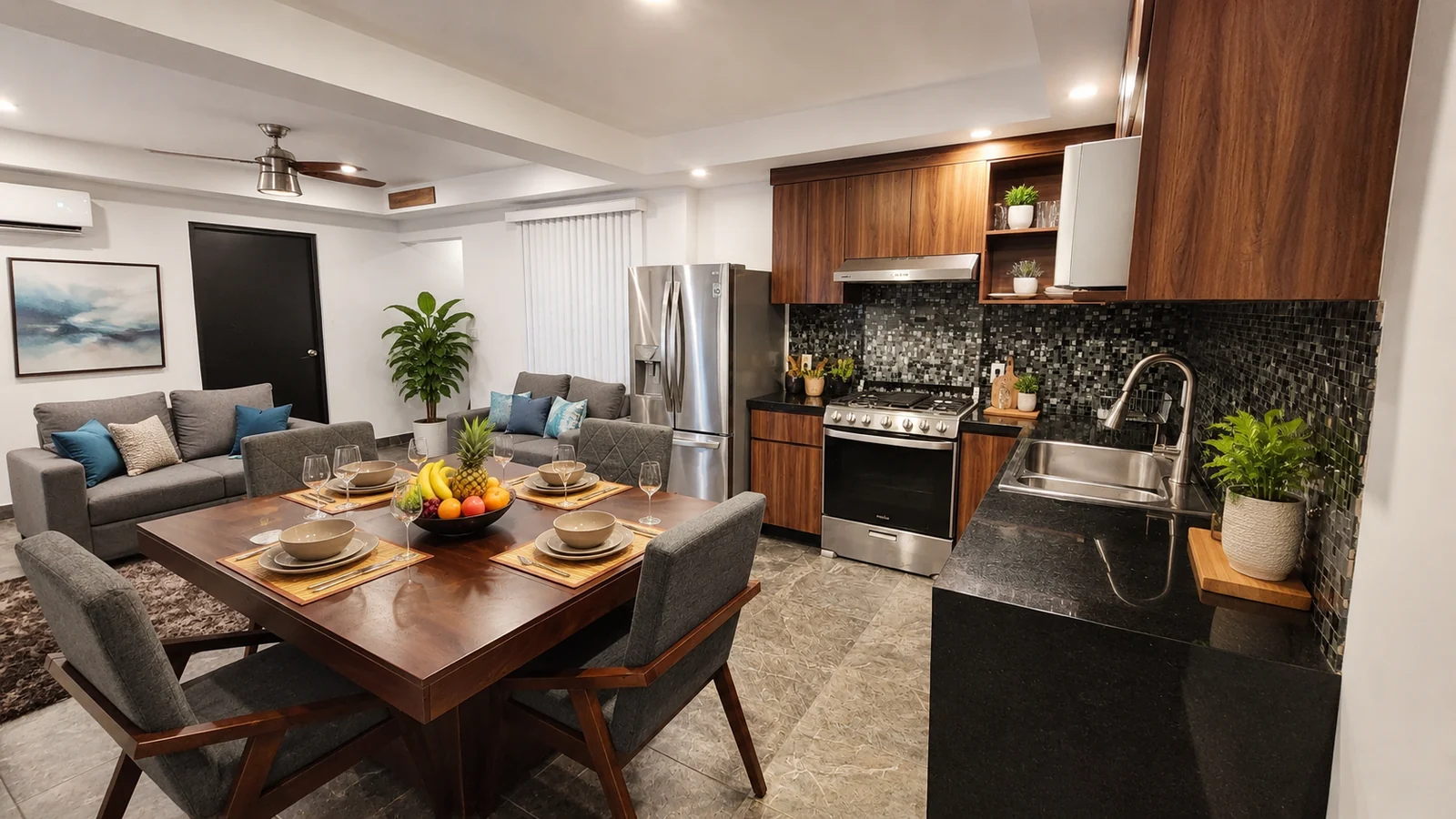 Sample furnished residence with dining table, living area and kitchen