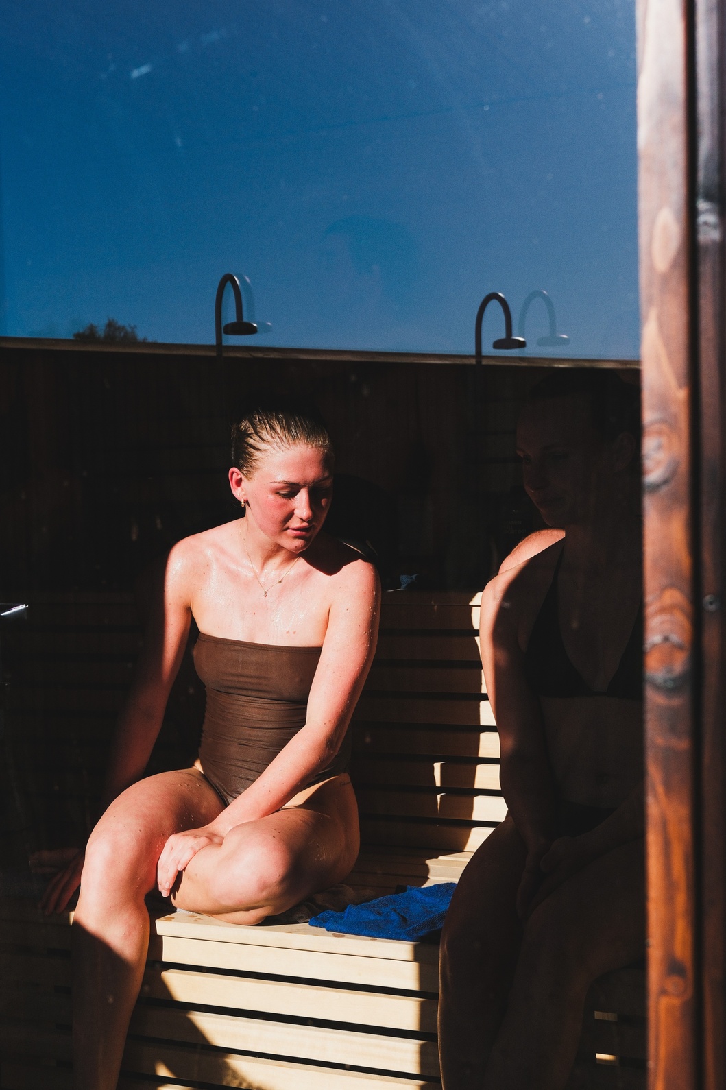 Guest sits relaxed in the sauna