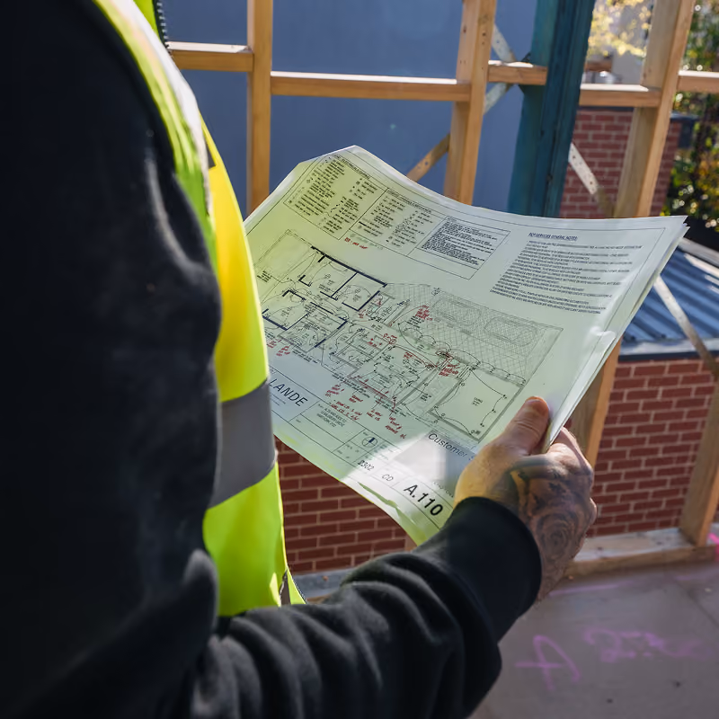 Electrician looking at plans