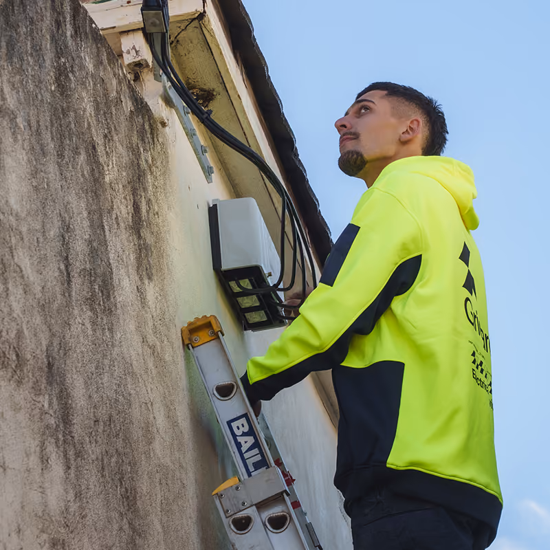 Electrician plugging in power
