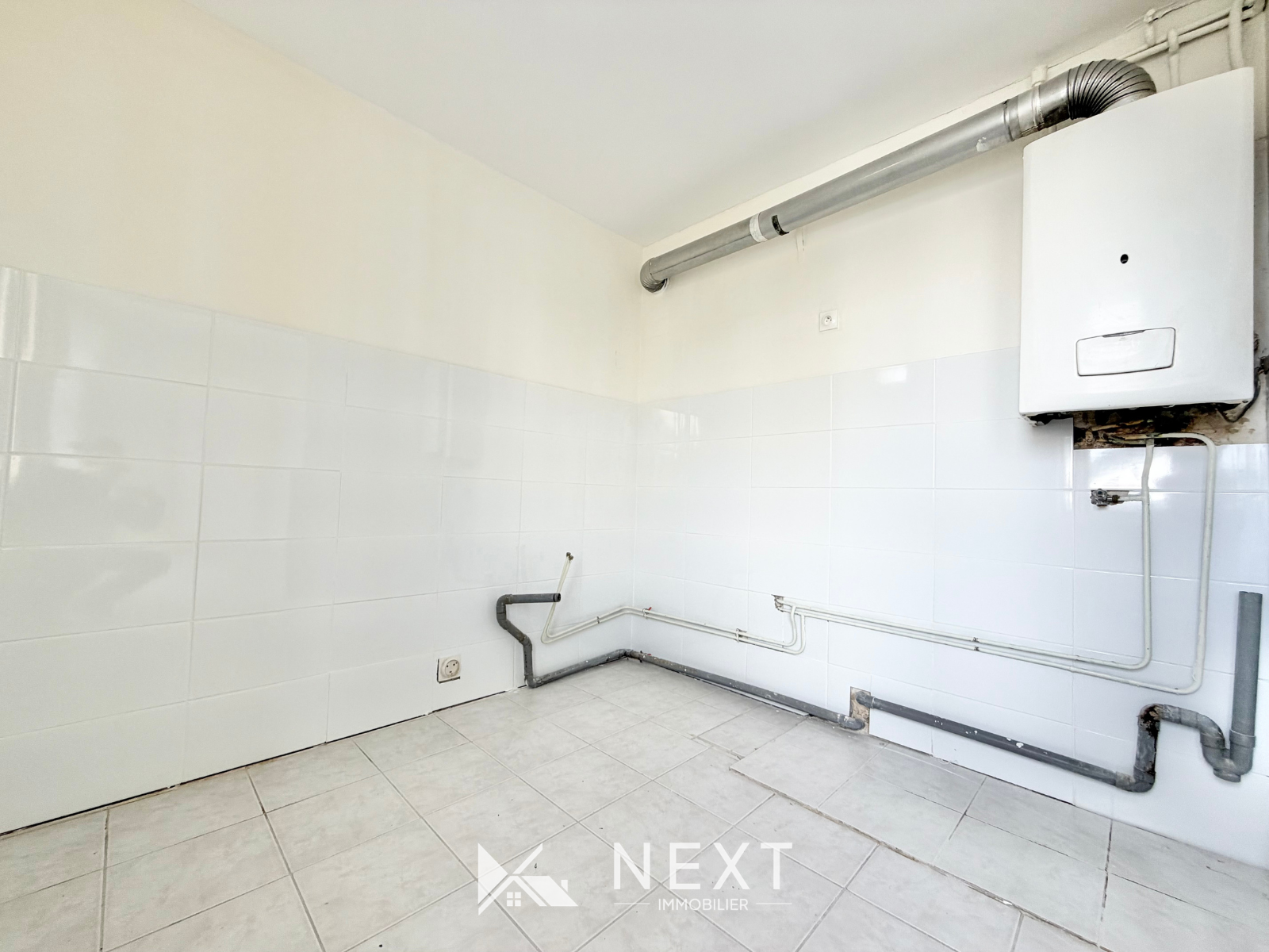 Appartement T4 avec balcon et vue Belledonne et Chartreuse à proximité immédiate du campus Neyrpic - 57 m² - St martin d heres - 17 — photo 7