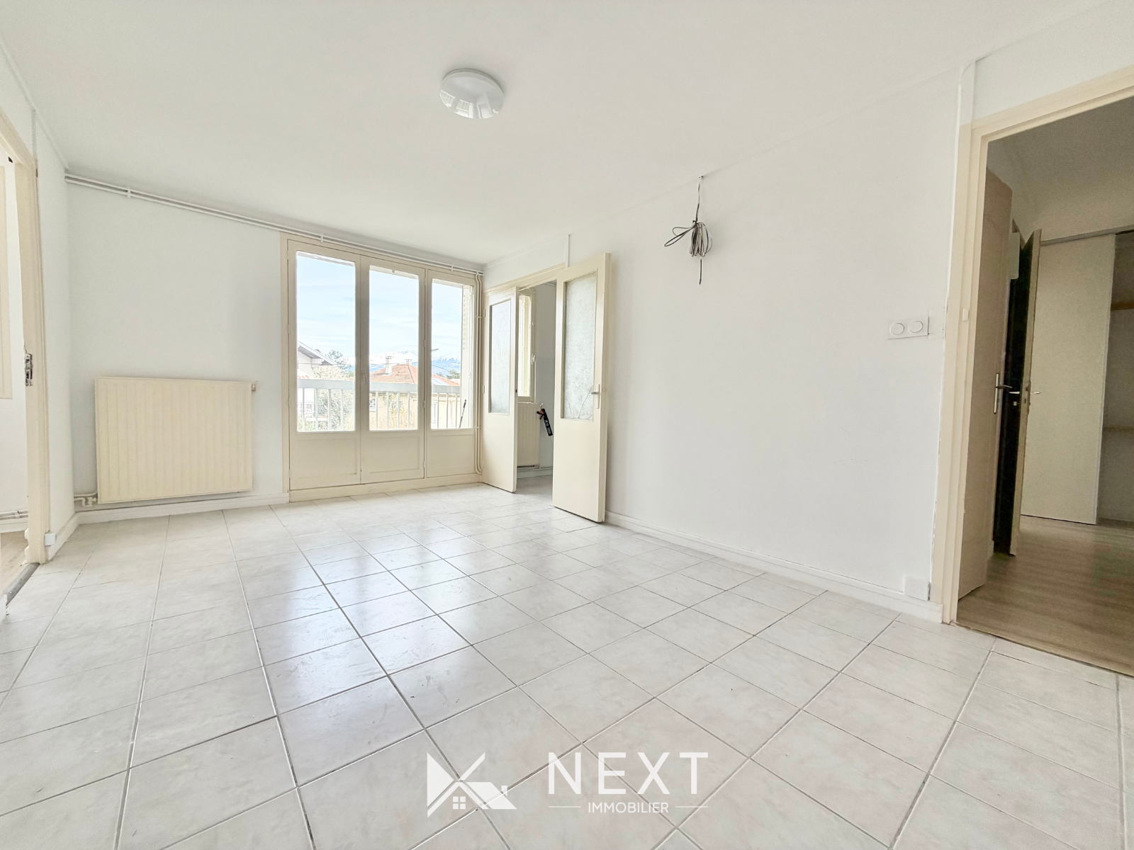 Appartement T4 avec balcon et vue Belledonne et Chartreuse à proximité immédiate du campus Neyrpic - 57 m² - St martin d heres - 17 — photo 2