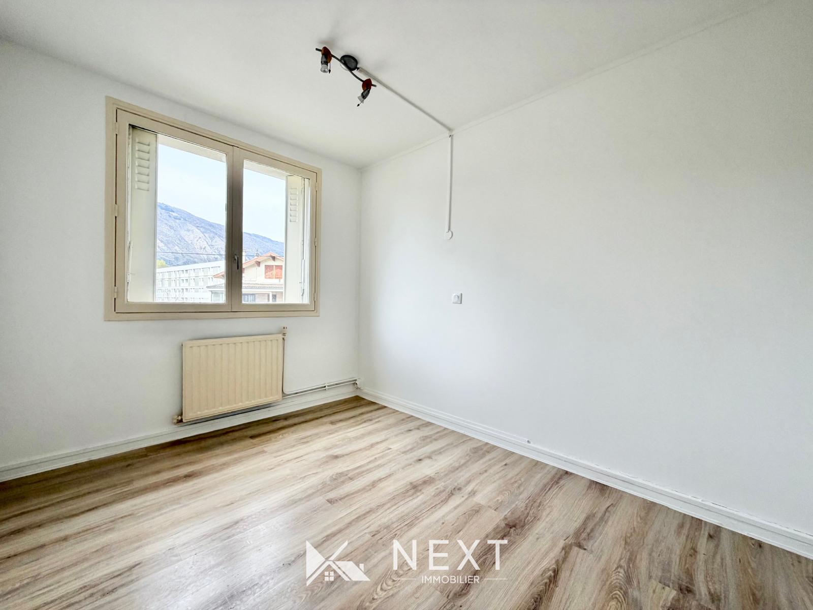Appartement T4 avec balcon et vue Belledonne et Chartreuse à proximité immédiate du campus Neyrpic - 57 m² - St martin d heres - 17 — photo 6