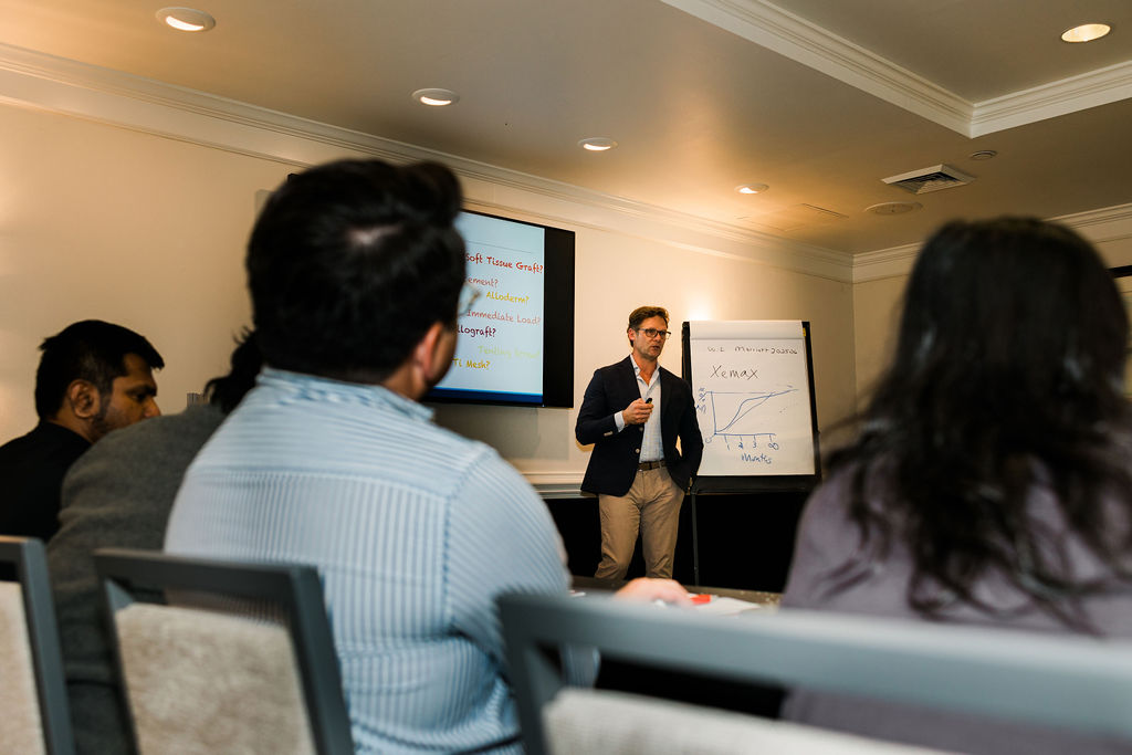 Dr. Rick Kapitan speaking at a CIA Implants course.