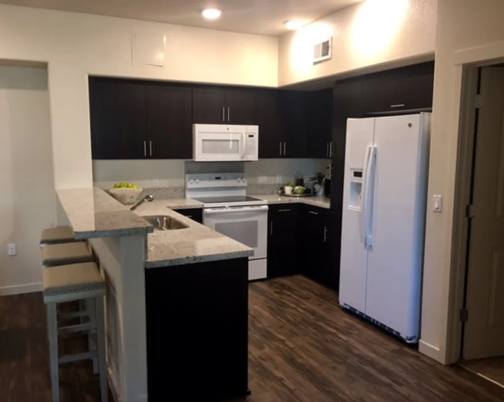 Kitchen with brown cabinets