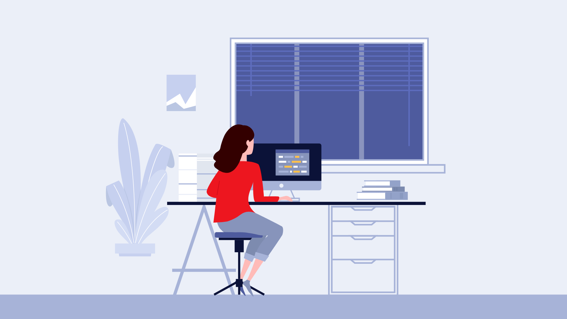 A woman working on a computer.
