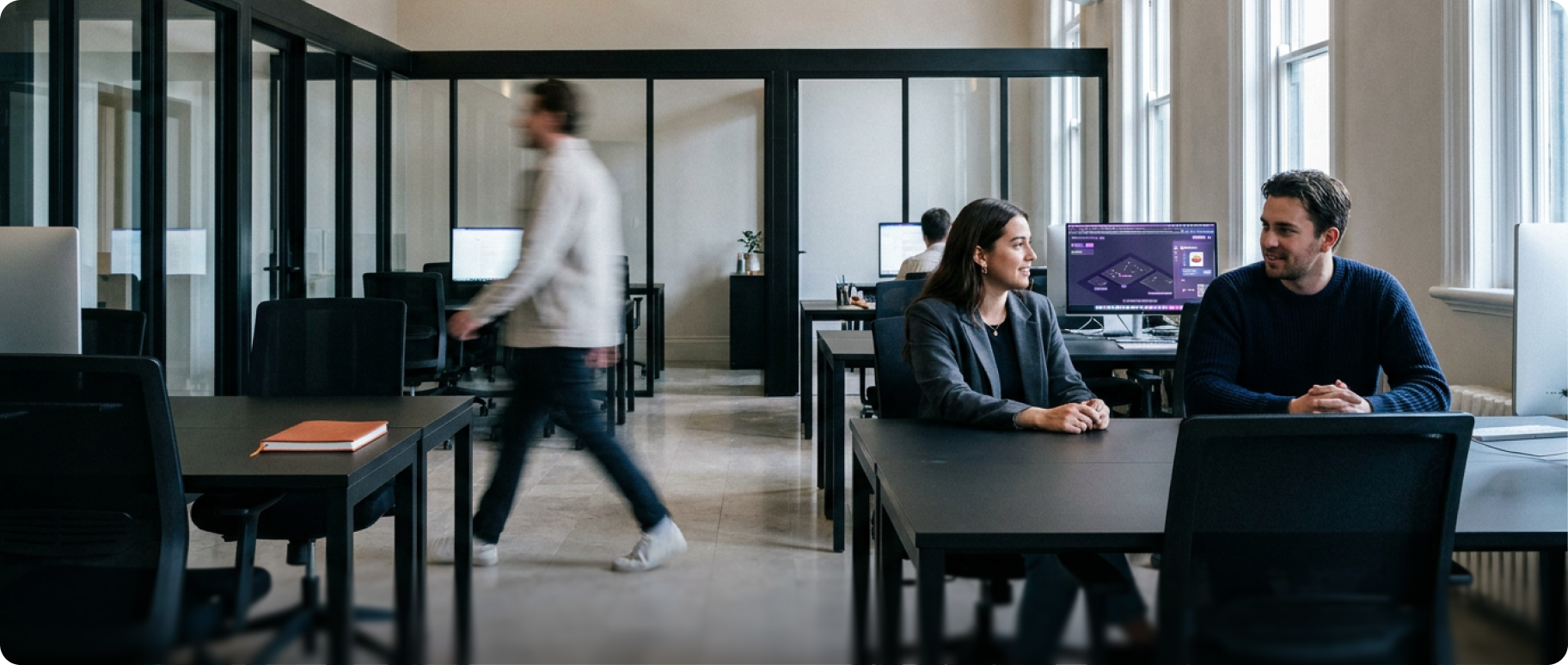 Colleagues meeting in a modern office