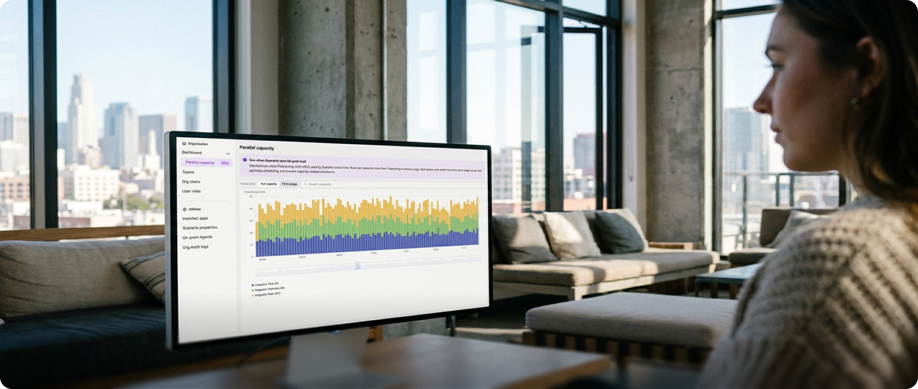 Woman reviewing a chart on a monitor