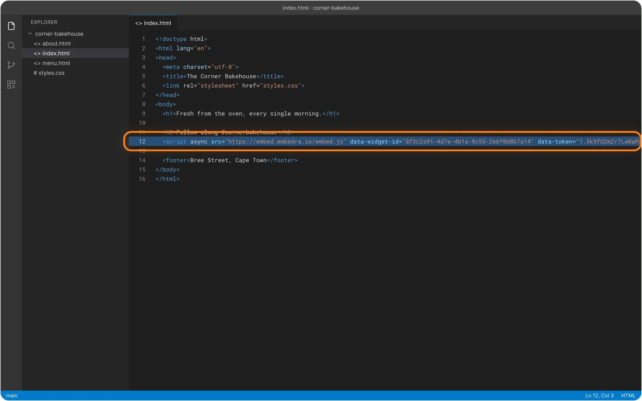 A page's HTML file with the Embedra line pasted inside the body where the feed should appear