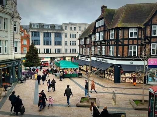 Busy pedestrianised high street in Bromley