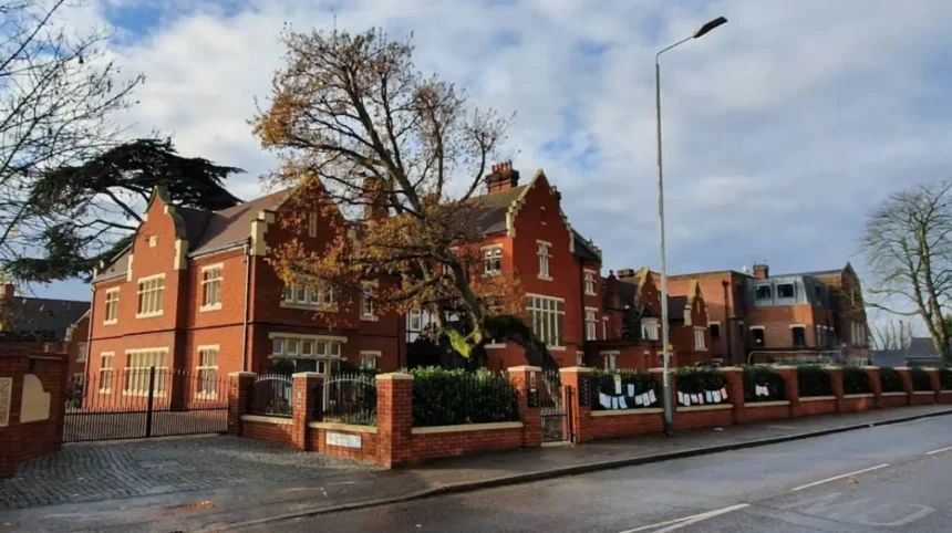 Red brick building and grounds in Havering