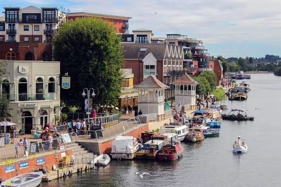 Riverside buildings and boats on the Thames at Kingston