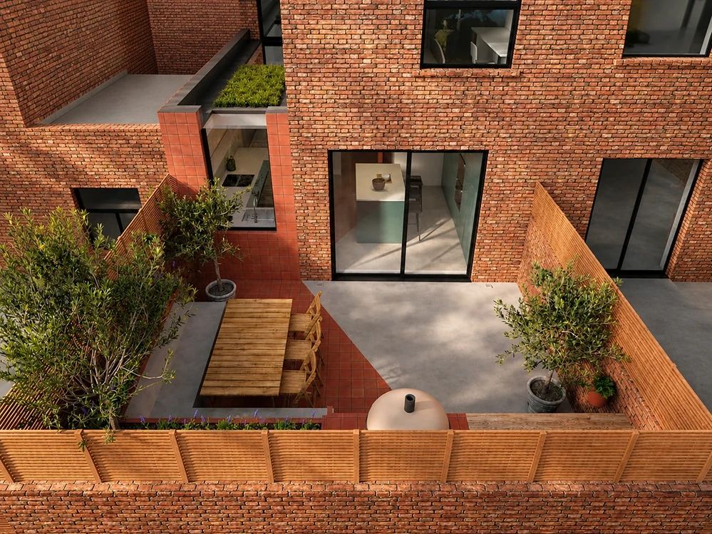 Brick-walled rear courtyard of a Camden home seen from above