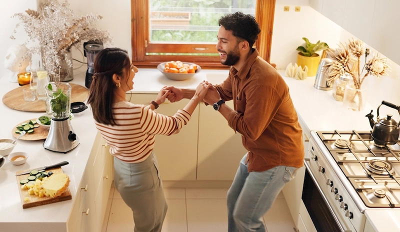 Couple preparing a healthy meal together with practical nutrition support