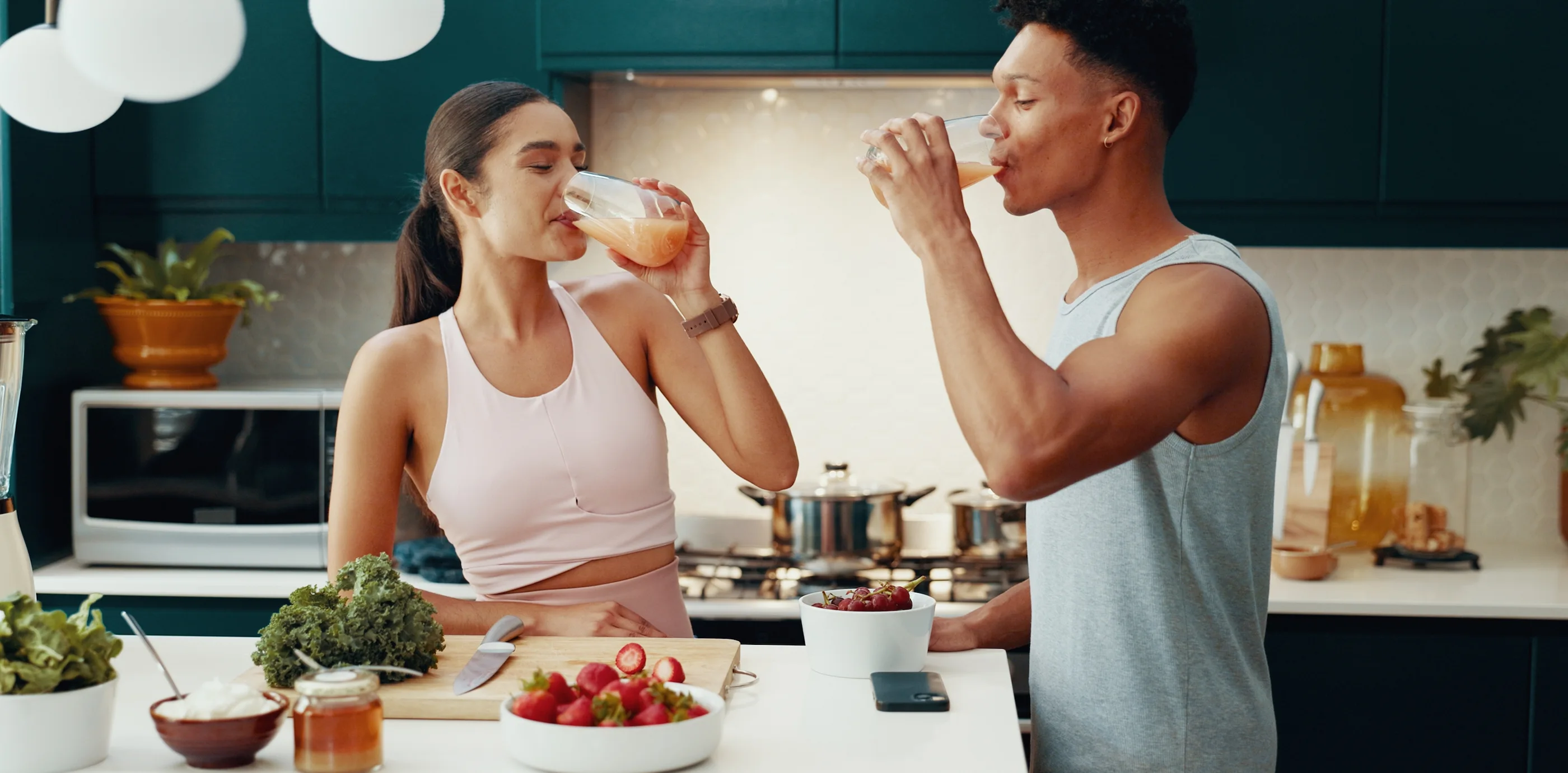 Couple enjoying a nutritious meal and healthy drinks together
