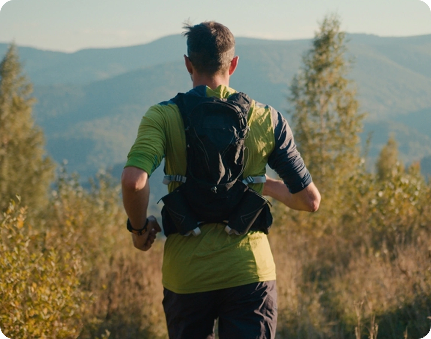 Trail runner following a mountain path as part of an active lifestyle