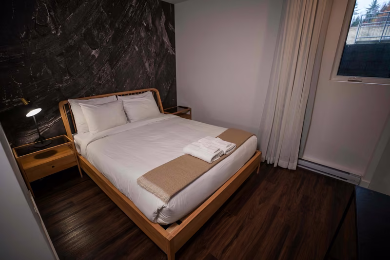 Chambre 1 du condo 103 avec lit queen, Aurea Charlevoix