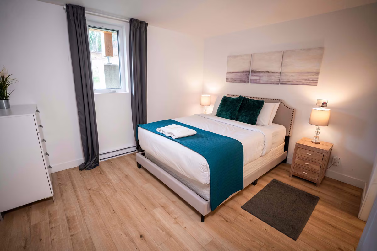 Chambre 1 du condo 105 avec lit queen, Aurea Charlevoix