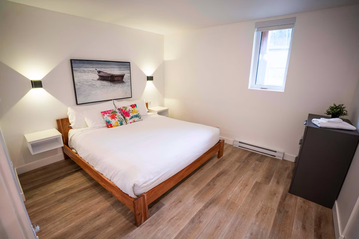 Chambre 2 du condo 110 avec lit king, Aurea Charlevoix