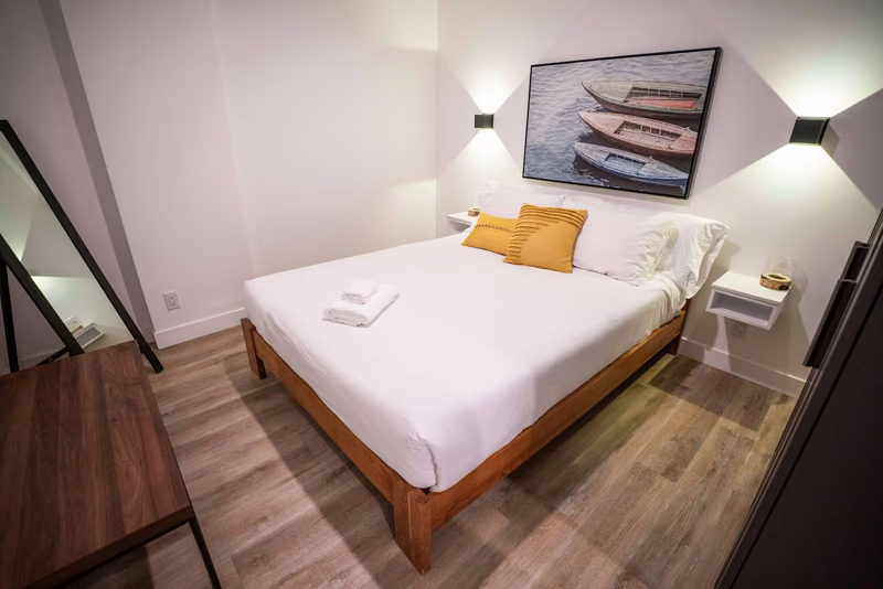 Chambre 1 du condo 110 avec lit queen, Aurea Charlevoix