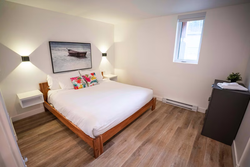 Chambre 2 du condo 110 avec lit king, Aurea Charlevoix