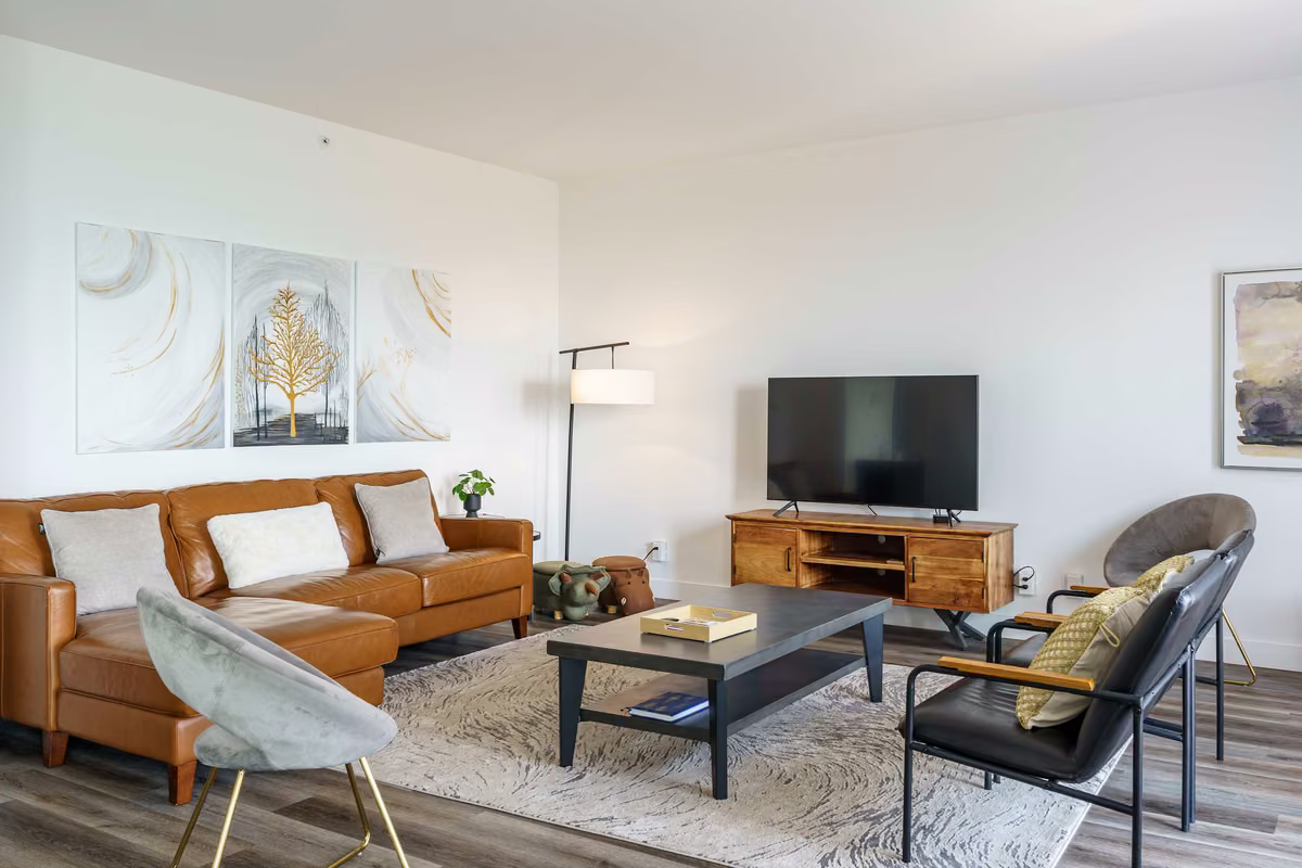 Salon du condo 203 avec vue sur le fleuve Saint-Laurent, Aurea Charlevoix