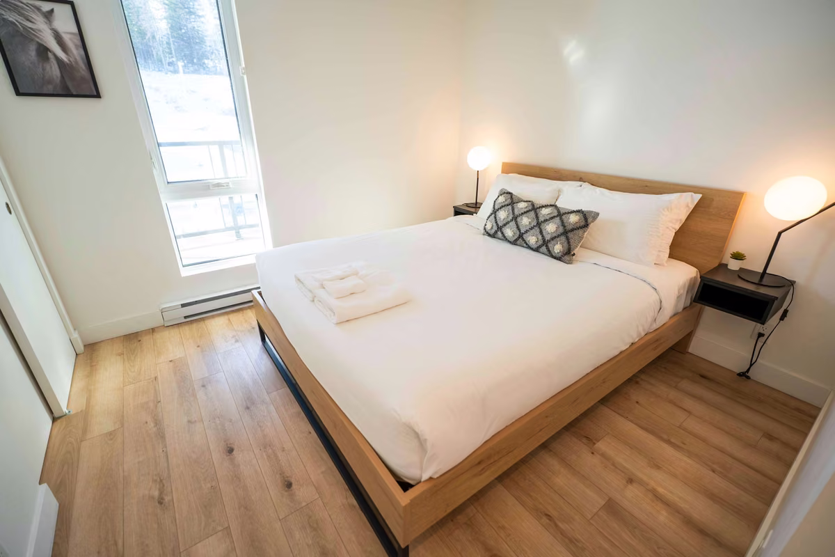 Chambre 1 du condo 210 avec lit queen, Aurea Charlevoix