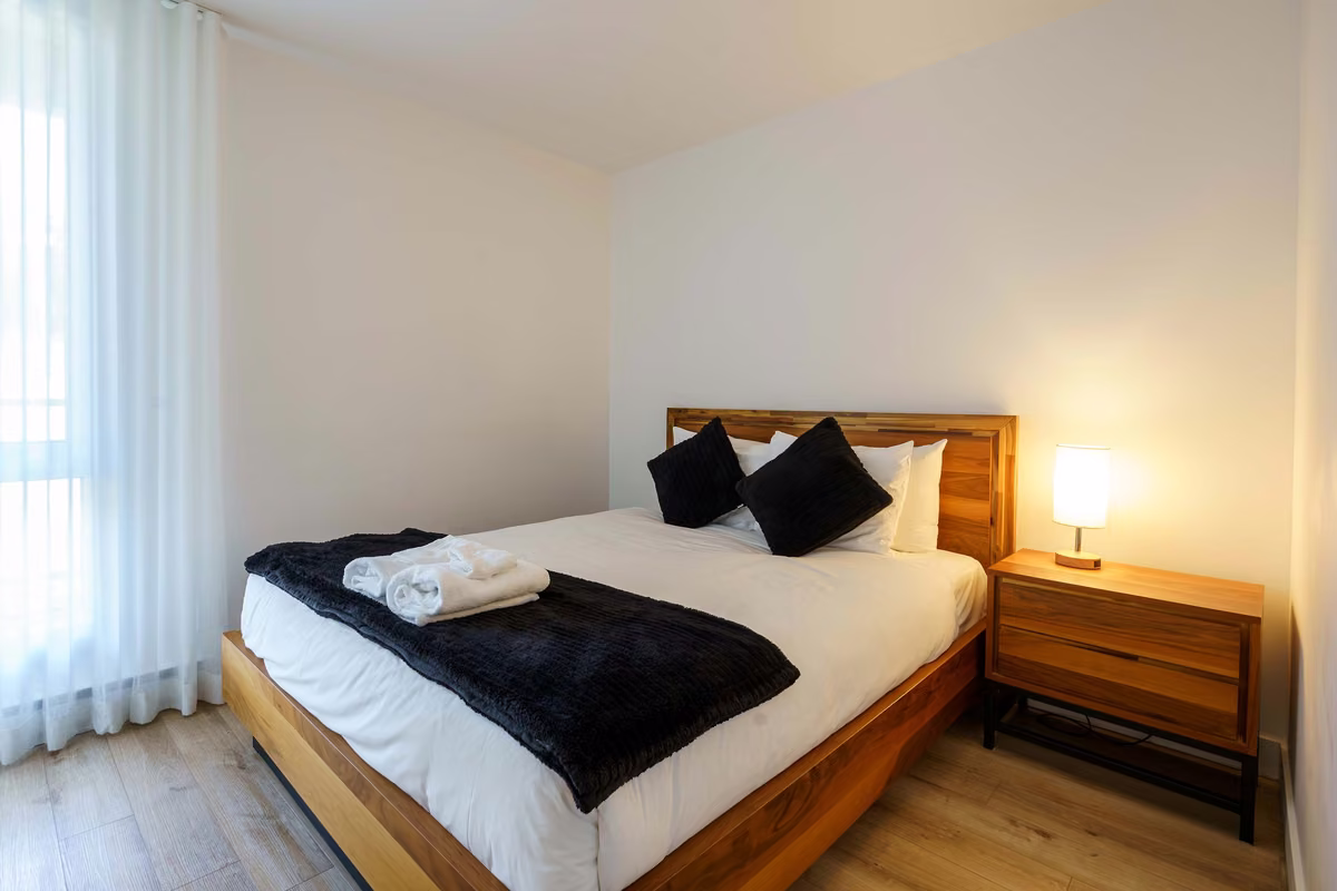 Chambre 1 du condo 304 avec lit queen, Aurea Charlevoix