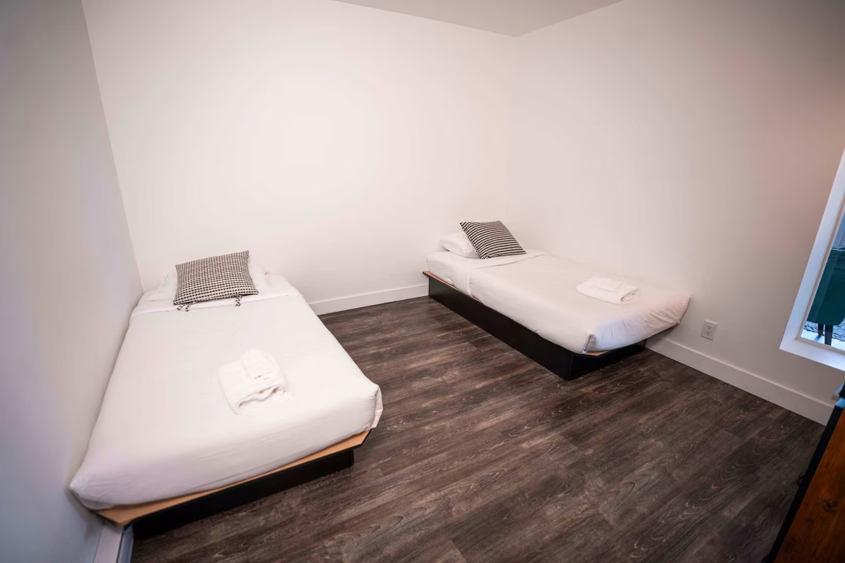 Chambre 3 du condo 310 avec lits simples, Aurea Charlevoix