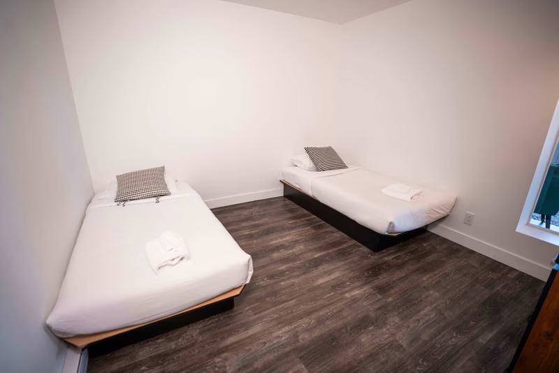 Chambre 3 du condo 310 avec lits simples, Aurea Charlevoix