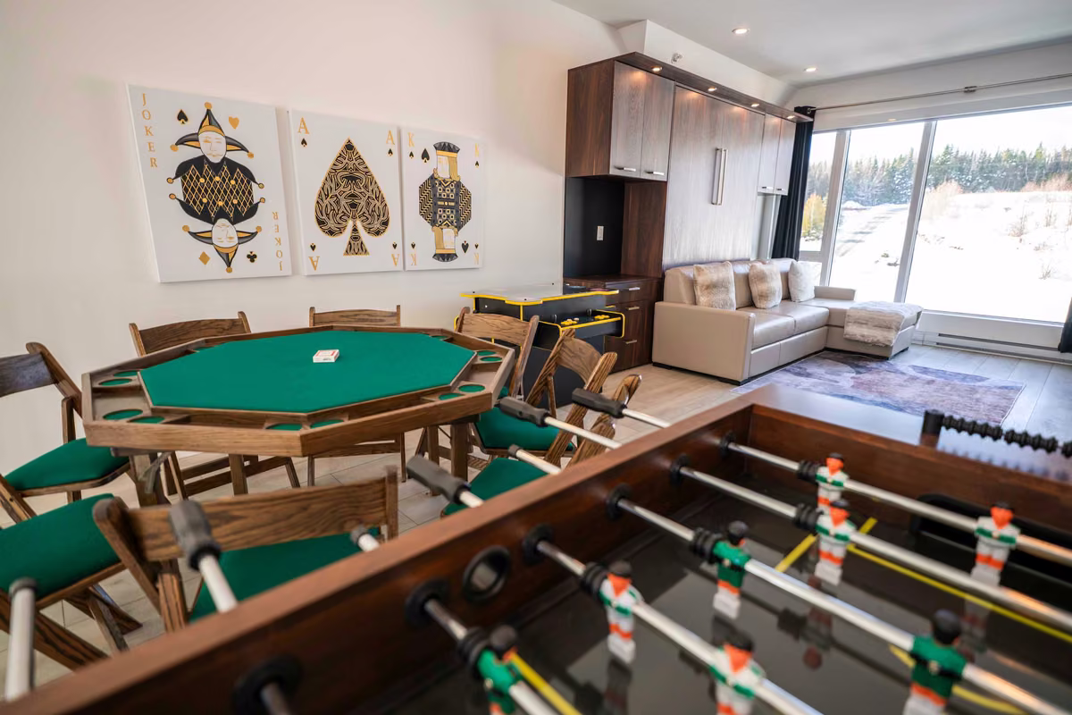 Espace de jeux du condo 401 avec baby-foot, Aurea Charlevoix