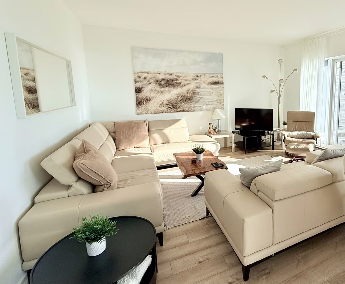 Salon du condo 101 avec vue sur le fleuve Saint-Laurent, Aurea Charlevoix